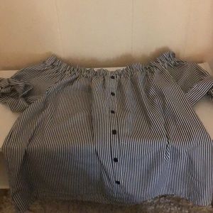 Off the shoulder shirt.